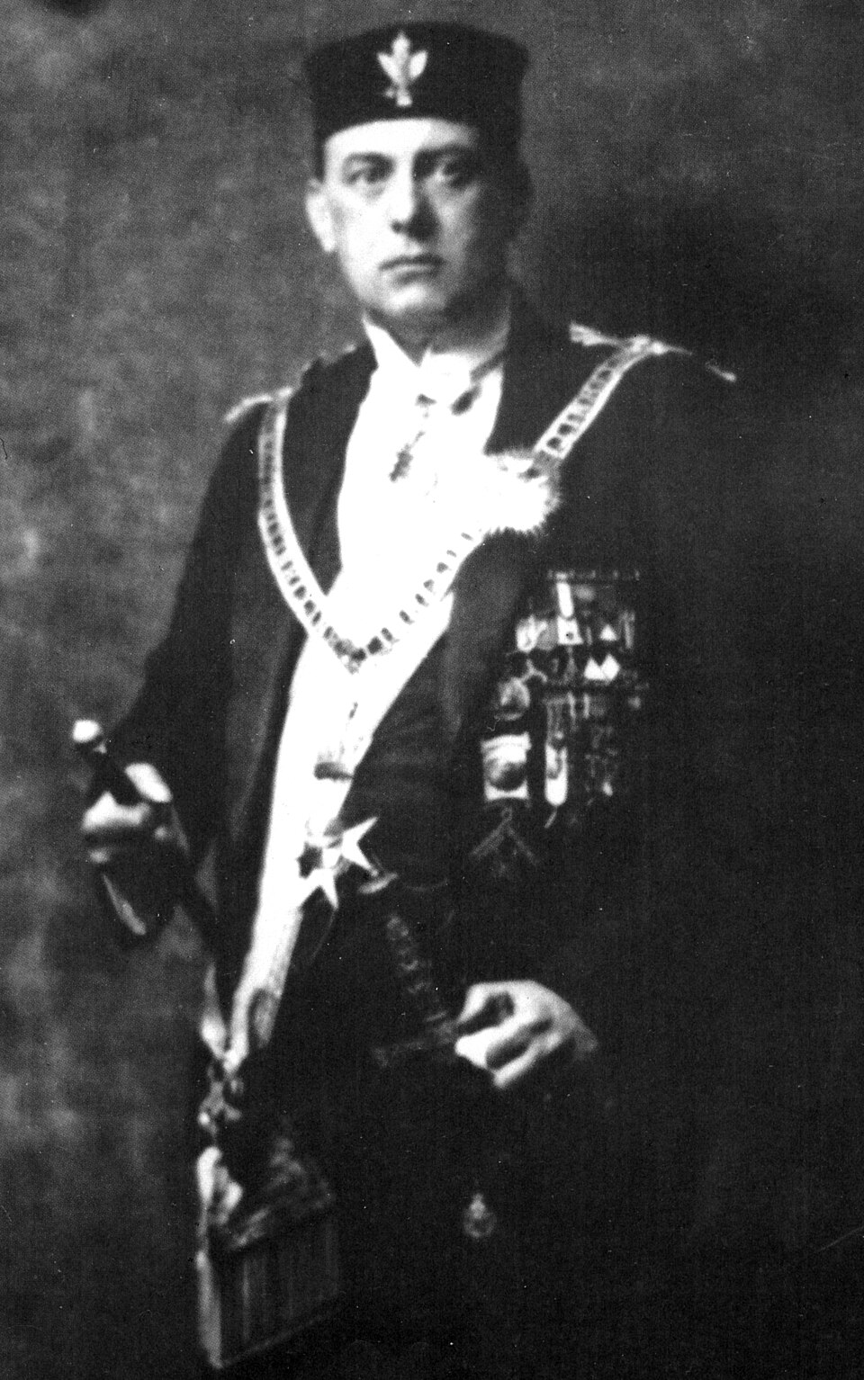 Black-and-white portrait of Aleister Crowley in ceremonial dress