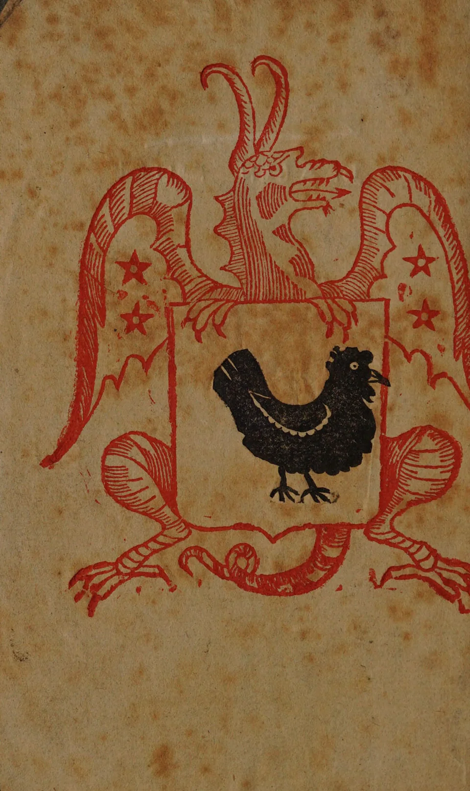 Red dragon holding a shield with a black hen in the Grand Grimoire frontispiece